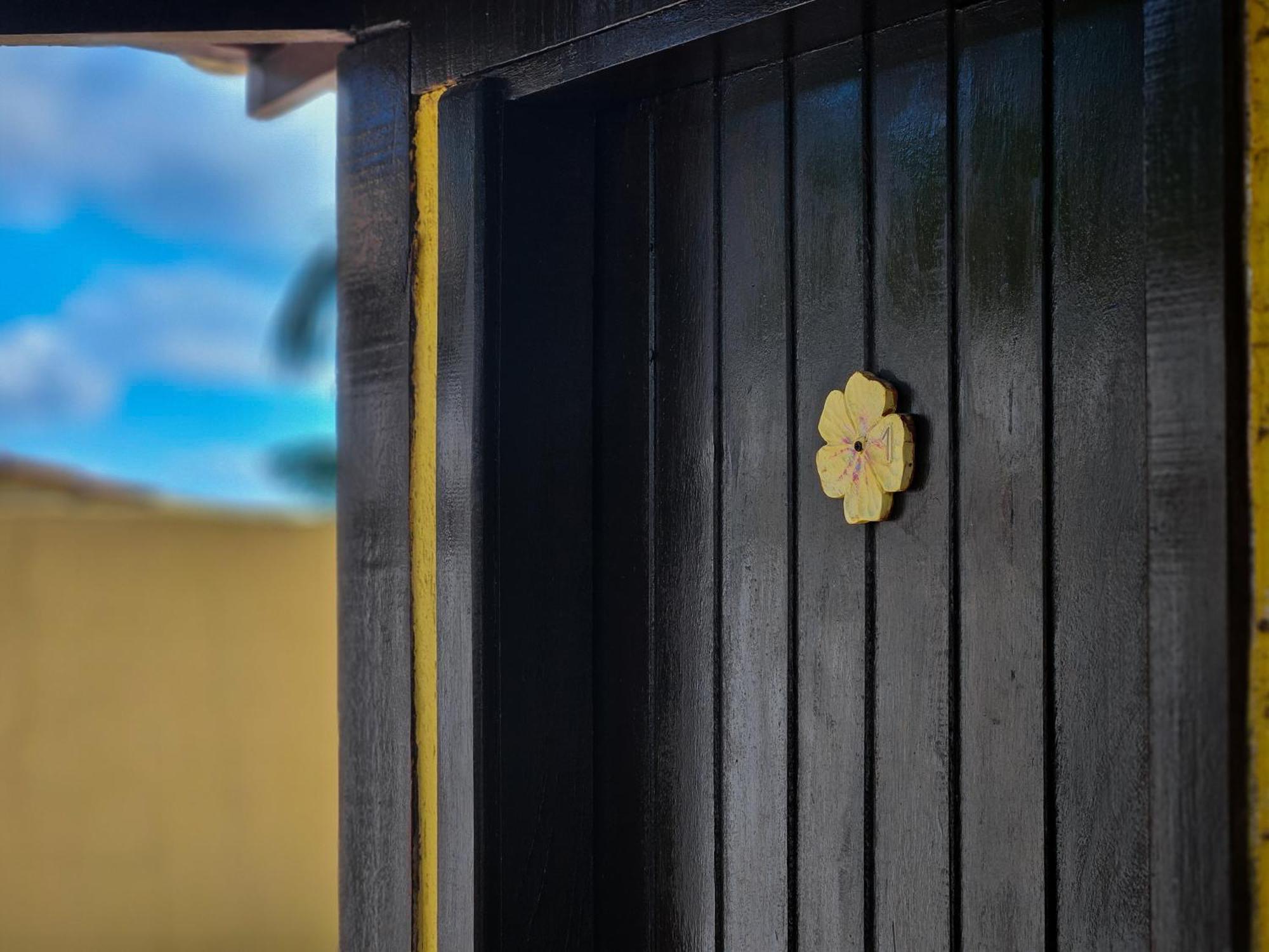 Hotel Bella Vista Ocean View Búzios Exterior foto A golden flower-shaped knob on a door