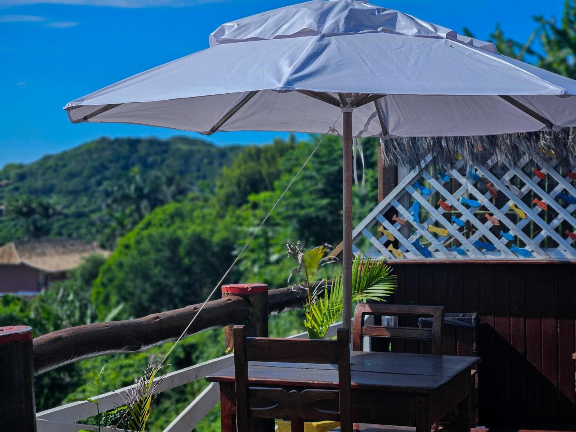 Hotel Bella Vista Ocean View Búzios Exterior foto A patio umbrella