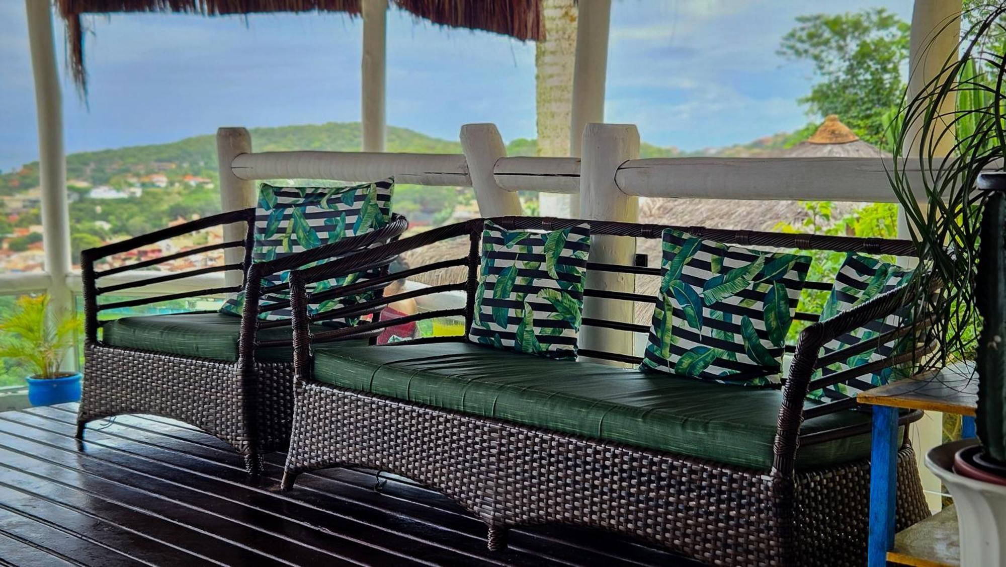 Hotel Bella Vista Ocean View Búzios Exterior foto A rattan sofa